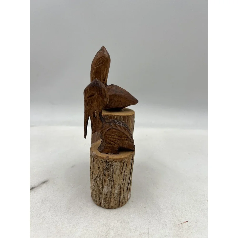 Hand Carved Wood Pelican Pair Figurines on Log Bases Rustic Coastal Folk Art